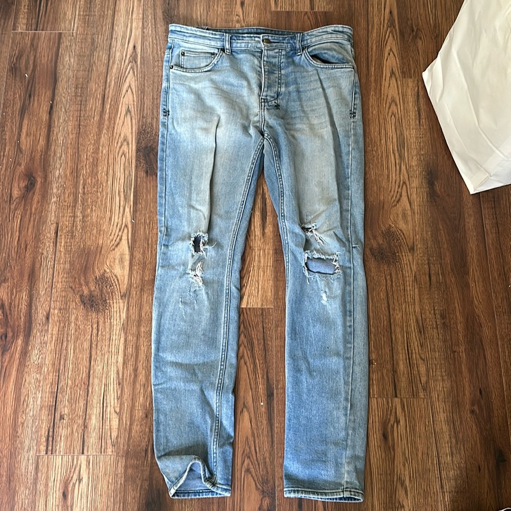 KSUBI - gently worn sz 34 ripped jeans.